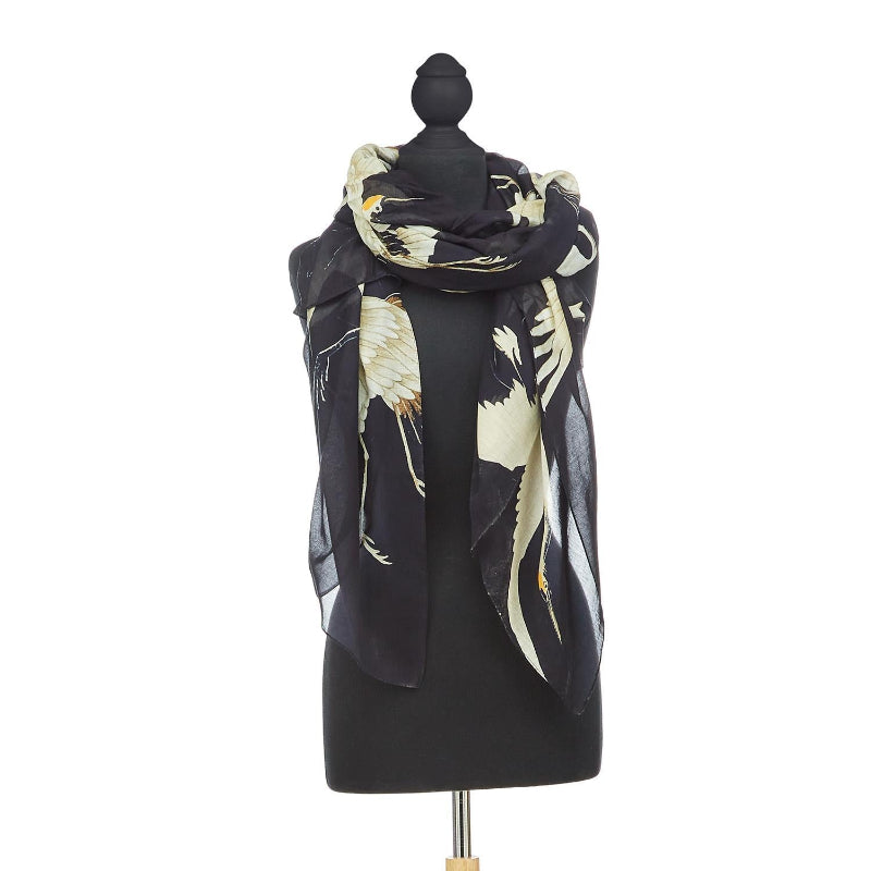 One Hundred Stars Stork Printed Lightweight Scarf in Black on mannequin