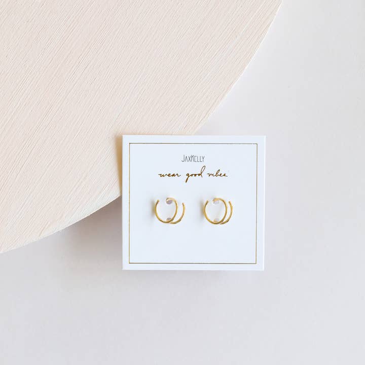 Minimalist Spiral 18K Gold Vermeil Hoop Earrings on branded card