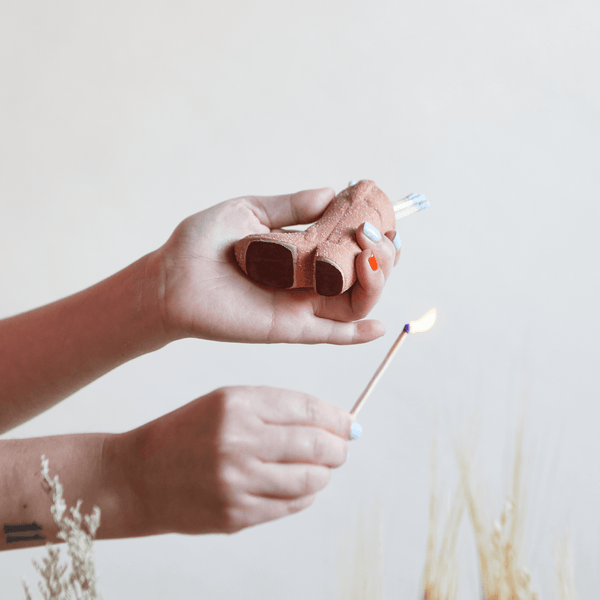 Vintage Style Cowboy Boot Match Holder and Striker Lifestyle Photo
