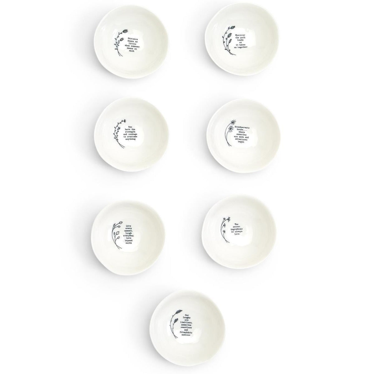 Porcelain Wobbly Bowl with black line drawn illustration and words in assorted designs.