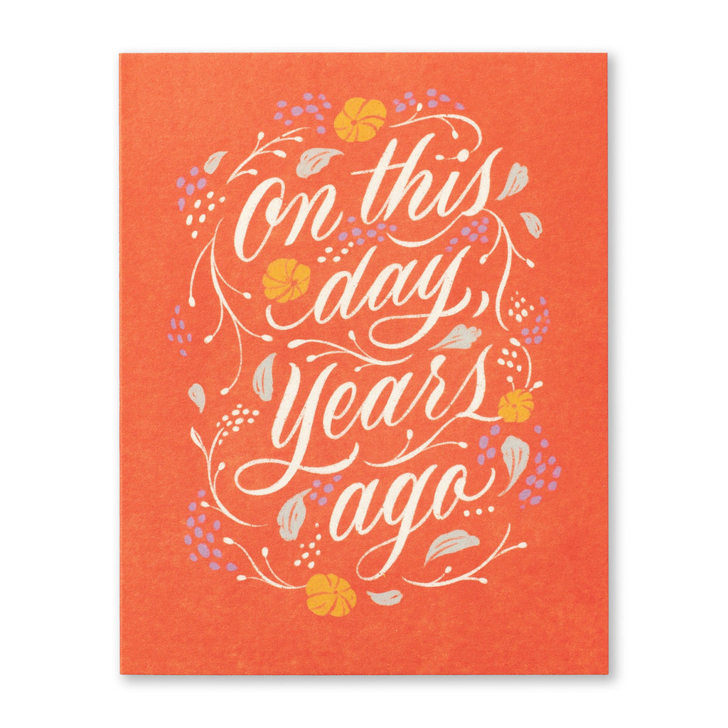 Birthday Greeting Card - On This Day Years Ago. Illustration shows a coral orange background with script typography.