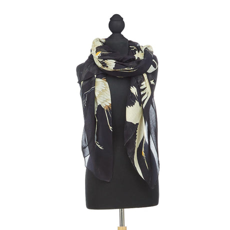 One Hundred Stars Stork Printed Lightweight Scarf in Black on mannequin