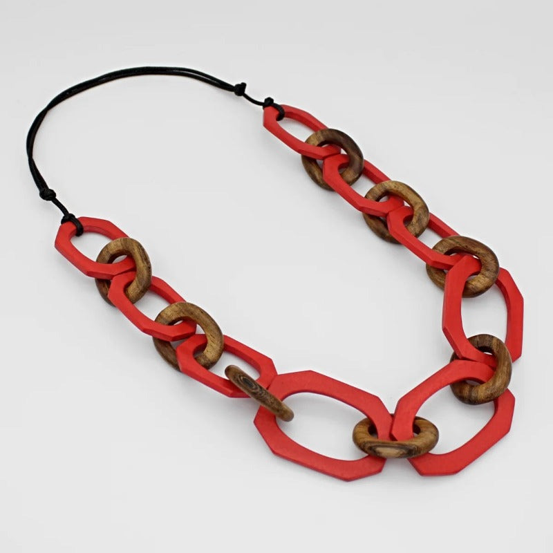 Chain Link Red Luzara Wood Bead Statement Necklace Laying Flat