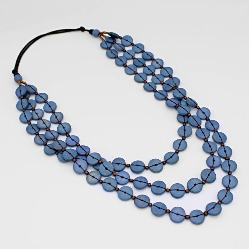 Denim Blue Wood Bead Jacey Triple Strand Necklace Laying Flat