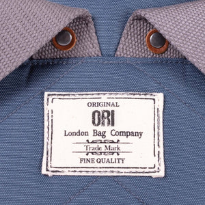 Bantry B Small Sustainable Recycled Canvas Backpack Airforce Original Ori London Bag Company Trademark Label Close Up