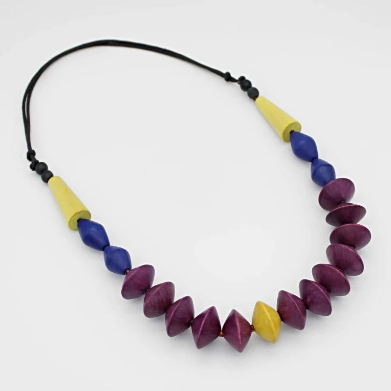 Purple Finola Wood Bead Statement Necklace Laying Flat