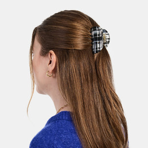 Person with the Chunks Juno Black and White Plaid Hair Claw Clip in a Half Up Half Down Hairstyle on a white background