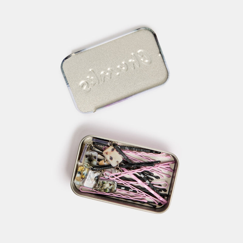 Chunks Kitty Bobby Pins Set of 8 shown in open tin on white background