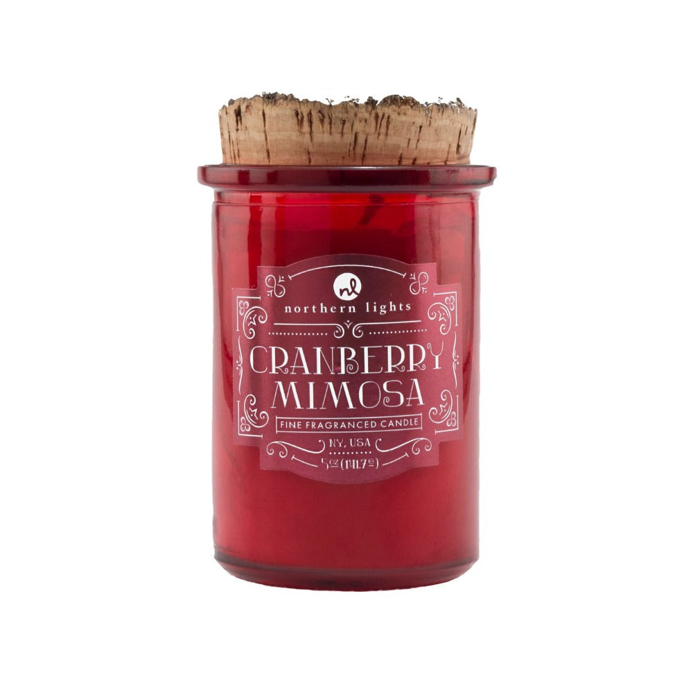 A homage to craft cocktails, this line combines unique fragrance and the wit of your favorite bartender. Served in a frosted colored glass with a natural cork lid. Northern Lights Cranberry Mimosa Scented Soy Candles.