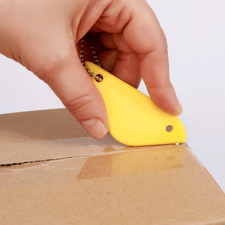 Birdy Safety Box Cutter Keychain in action. Ceramic blade never dulls.
