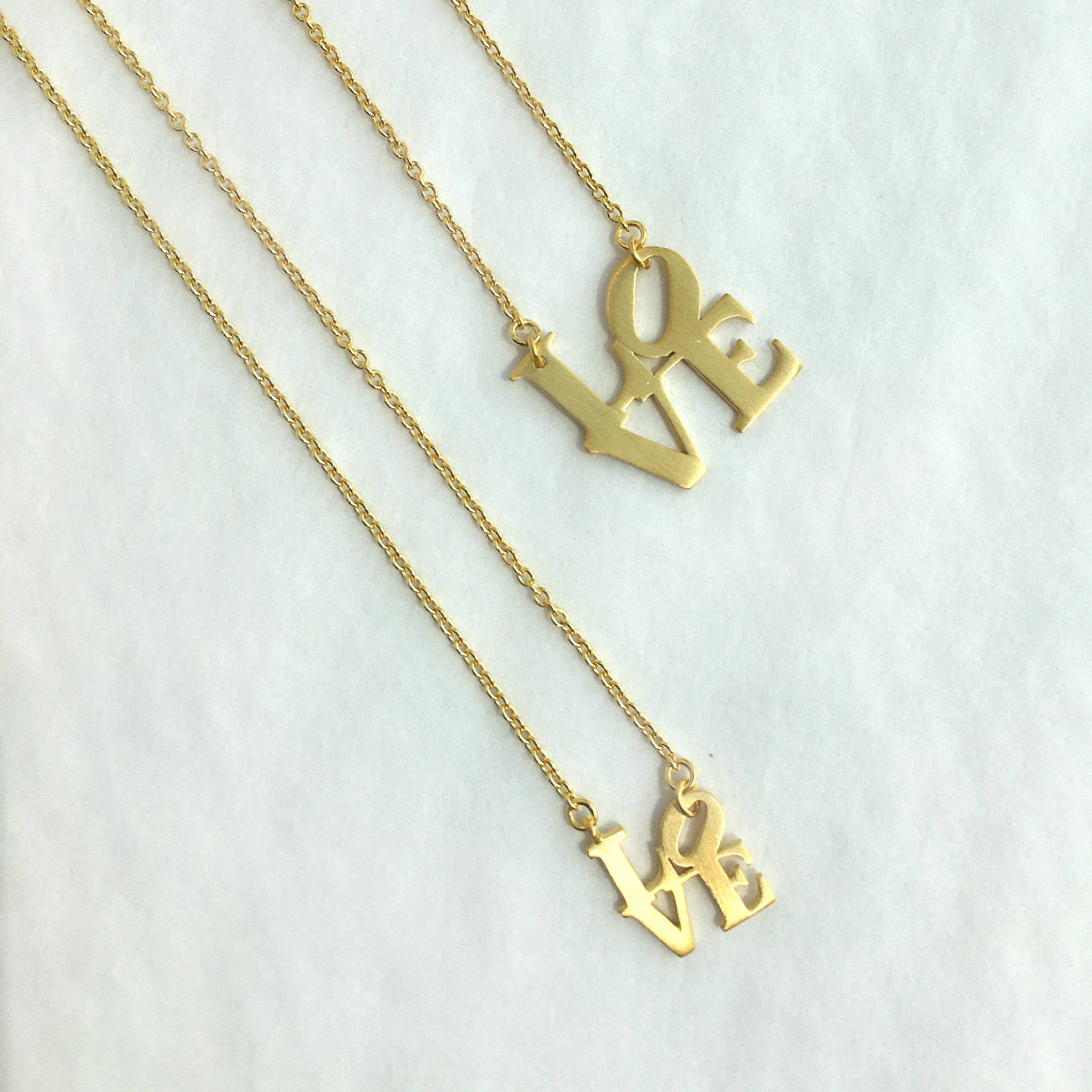 Love 2025 statue necklace