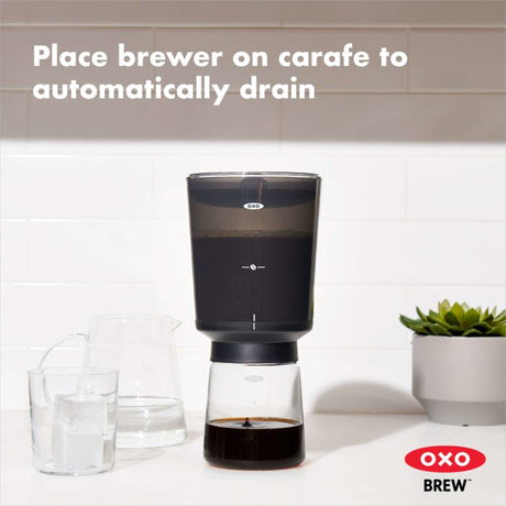 Compact Cold Brew Coffee Maker Place Brewer on Carafe to automatically drain