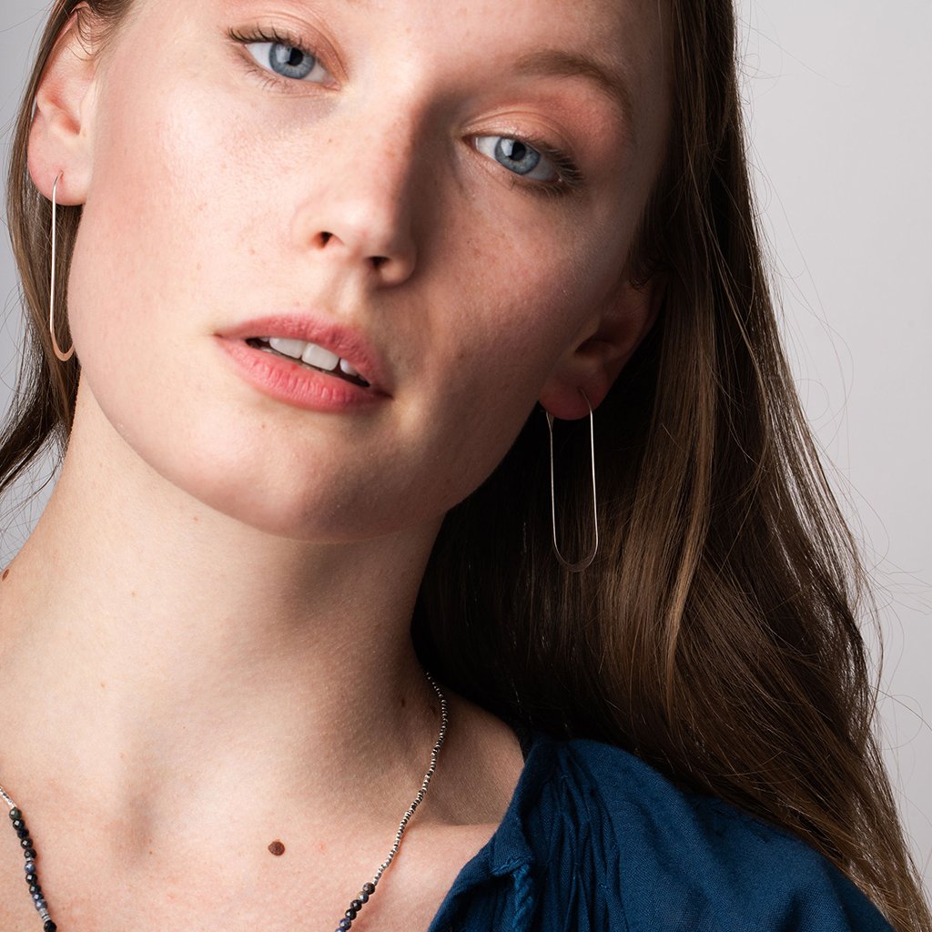 Refined Earring Collection - Cosmic Oval Hoop Earrings Sterling Silver Model