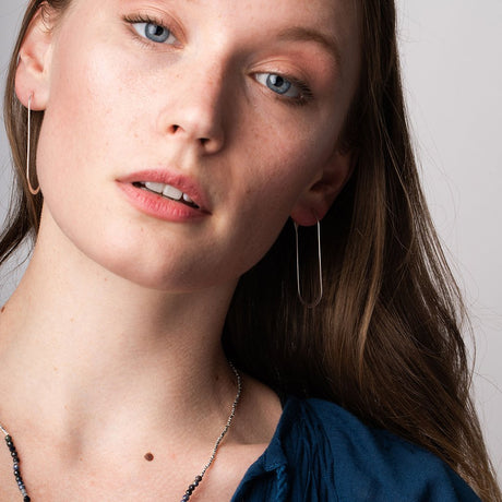 Refined Earring Collection - Cosmic Oval Hoop Earrings Sterling Silver Model