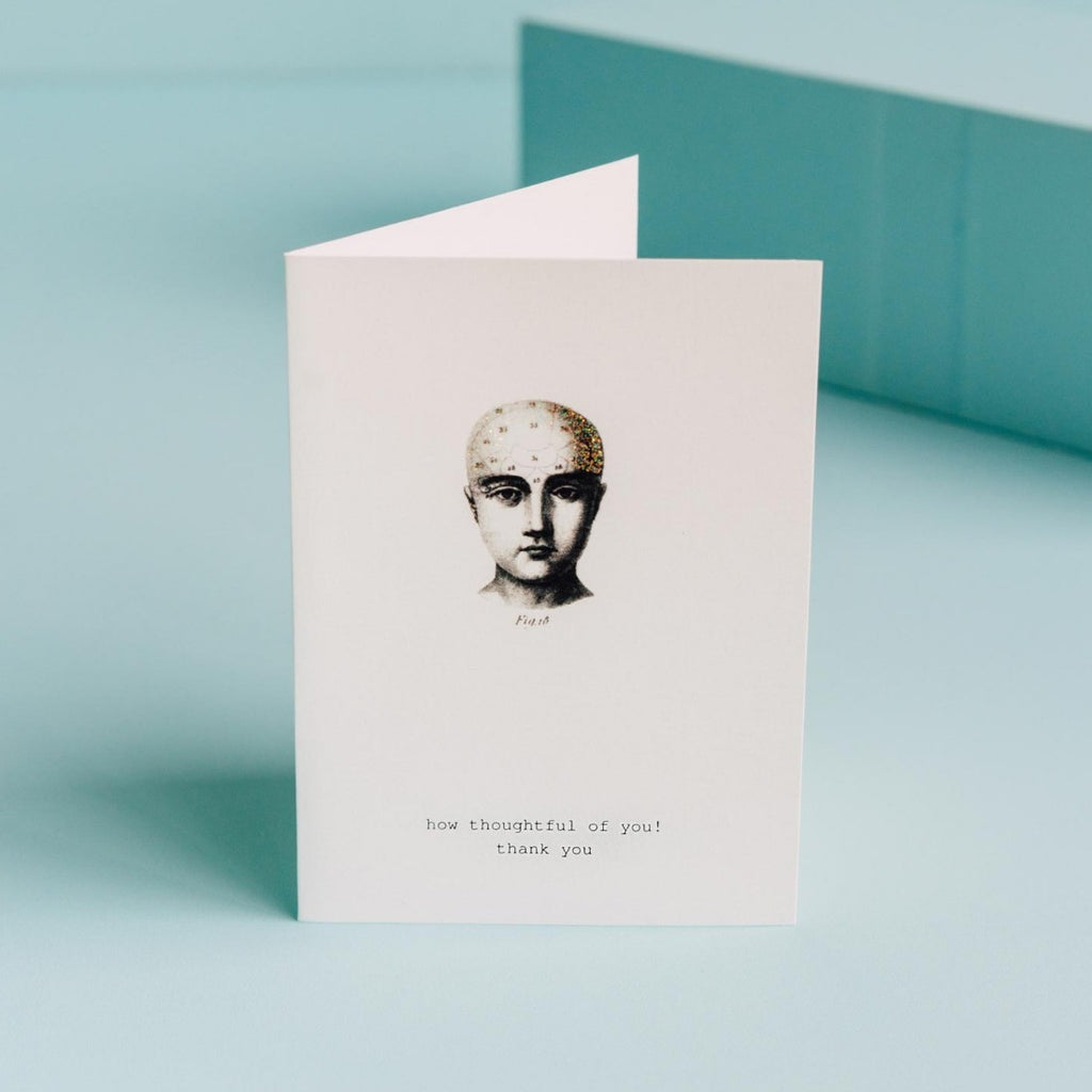 Greeting card reads: "How thoughtful of you! Thank you" A glittery illustration shows a vintage-style Phrenology head.